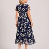 Magnolia | Abito floreale romantico ed elegante