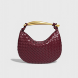 Gerda | Borsa intrecciata con manico dorato