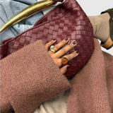 Gerda | Borsa intrecciata con manico dorato